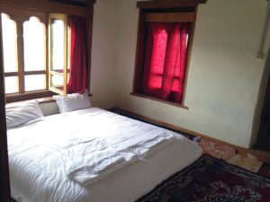 Farmhouse of Aum leki has a warm and cosy room for guests.